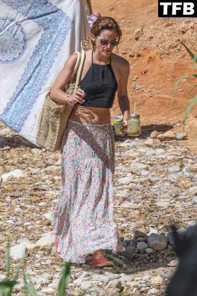 Emma Watson Displays Her Nude Tits On The Beach In Ibiza Photos