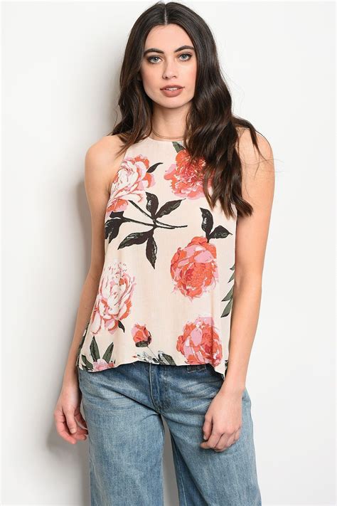 Ladies Fashion Sleeveless Floral Print Top That Features A Rounded