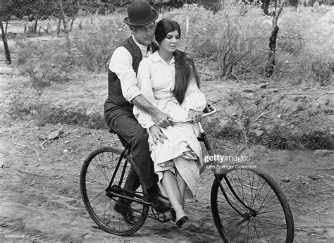Butch Cassidy And Etta Place Ride A Bicycle During A Scene From The