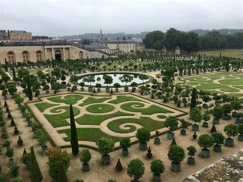 The rustic elegance of the garden place is impressive with the warm feeling of a mountain lodge. Secret to Touring the Palace of Versailles Grounds
