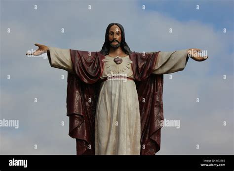 Statue Of Jesus Christ With Outstretched And Welcoming Arms Standing At