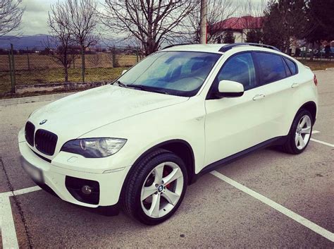 This is the bmw x6! Auto occasion BMW X6 40d Sport XDRIVE Diesel Blanc Grisons | VenteAuto.ch