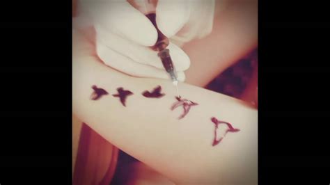 To create a tattoo, early henna artists usually use sticks, but today, there are cleaner methods of doing so. Bird tattoo with henna - YouTube