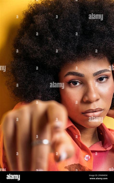 Beautiful Afro Woman Wearing Cool Makeup Pointing Her Finger And