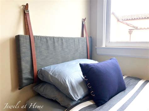 The biggest transformation in this room was the bed area. DIY Hanging Pillow Headboard | 1000 | Pillow headboard, Headboard, Cushion headboard