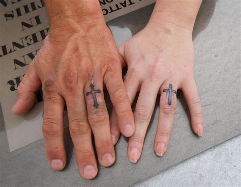 Finger tattoos on the inside of fingers tend to fade quicker than those on top. 49 Elegant Cross Tattoos On Finger