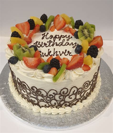 Chocolate Wrapped Fresh Cream Cake With Fruits Cb Rc016 Cake Boutique