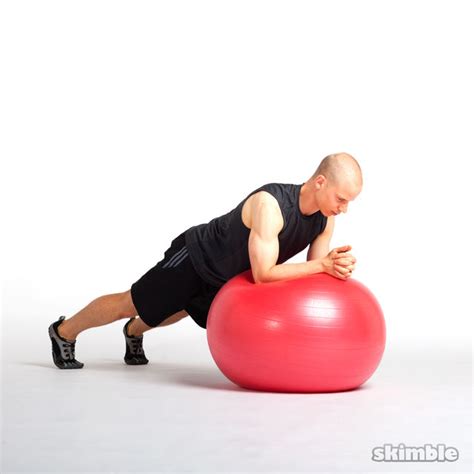 Side To Side Elbow Plank On Ball Exercise How To Workout Trainer By