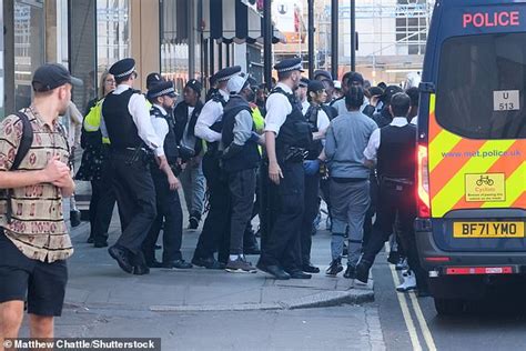 Chaos On Oxford Street Police Wielding Batons Clash With Dozens Of Youths Outside Microsoft