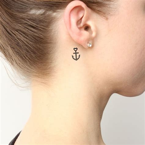 A special word, number, or roman numeral would be another way to add meaning to your behind the ear tattoo. cutelittletattoos: "Small anchor tattoo behind the right ...