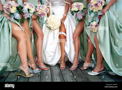 Bride And Brides Maids Showing Off Legs Stock Photo Alamy