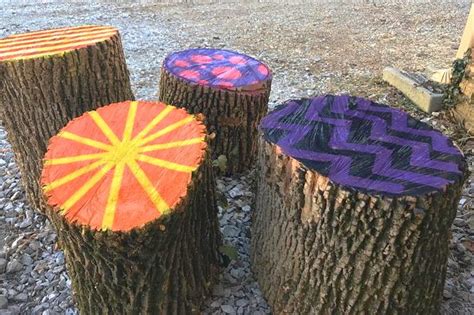 New Tactical Urbanism Project Adds Painted Tree Stump Seating To Bus