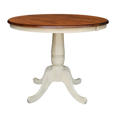 36 Round Dining Table With 12 Leaf In Antiqued Almondespresso