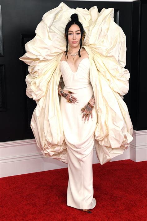 Needless to say, the outfit saw comparisons. What Noah Cyrus Wore for the 2021 Grammy Awards, Photos