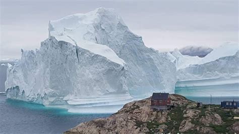 A Giant Iceberg Parked Offshore Its Stunning But Villagers Hit The