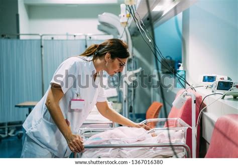 Female Doctor Examining Newborn Baby Hospital Stock Photo 1367016380