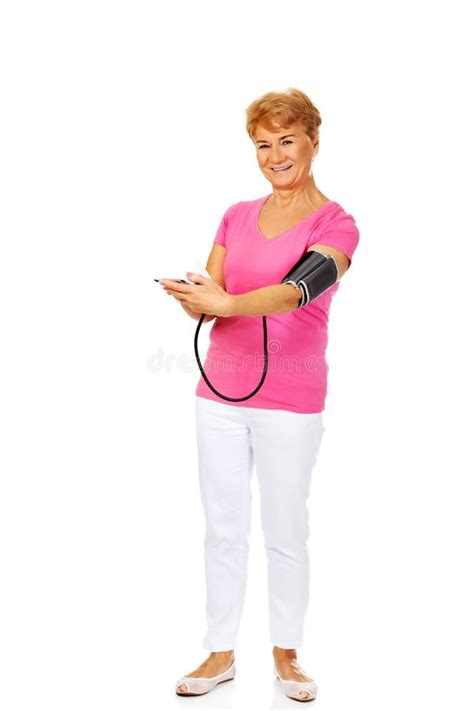 Smiling Senior Woman Measuring Blood Pressure Stock Photo Image Of