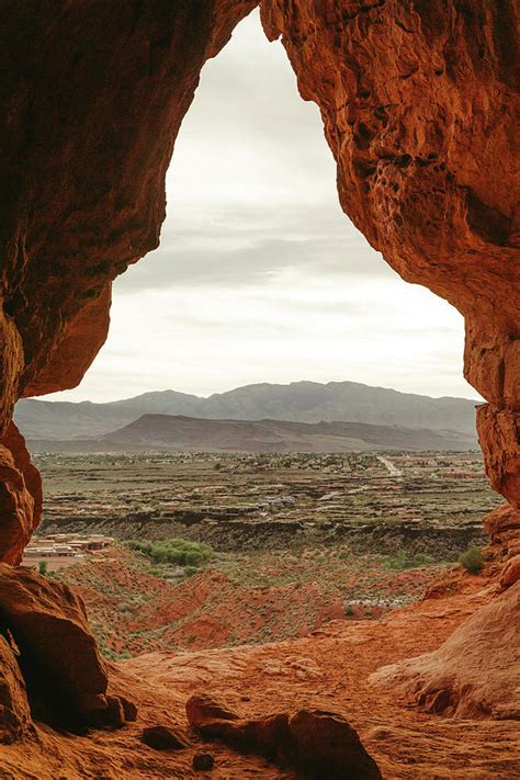 Desert Cave Entrance Overlooking The Suburbs Of St George Utah