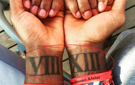 Kyrie irving has tattoo of numeric numbers inked on the wrist of both of the hands that reads, viii xiii which is the representation of date 8/13. Kyrie Irving's 21 Tattoos & Their Meanings - Body Art Guru