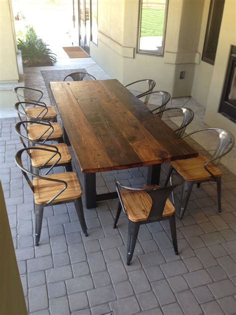 A nice garden is only half the fun if you can't sit there with friends and family on summer days, or even nights, to have a yarn and a bite from the barbecue. Reclaimed Wood and Steel Outdoor Dining Table 1 | Wood ...