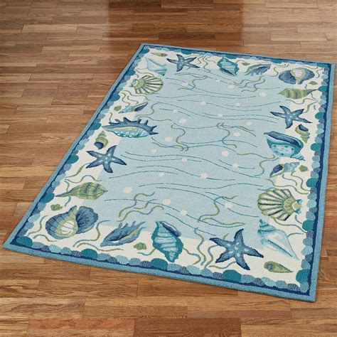 Blue Lagoon Seashell Coastal Area Rugs | Coastal area rugs, Coastal style, Coastal decor