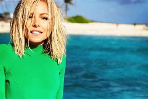 kelly ripa shares sexy pool picture of mark consuelos