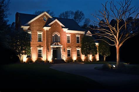 Outdoor Lighting Perspectives Brings This Southern Brick Home To Life