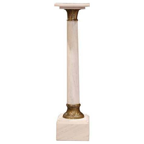 19th Century French White Marble Pedestal With Brass Rings And Swivel