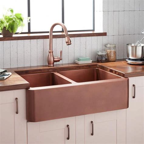 That said, with the right hammered finish, these imperfections usually aren't very noticeable. 36" Tegan 70/30 Offset Double-Bowl Hammered Copper Farmhouse Sink - Farmhouse Sinks - Kitchen # ...