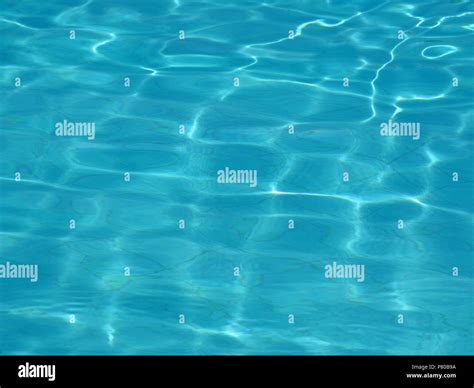 Water Surface Of A Swimming Pool With Sun Reflections Stock Photo Alamy