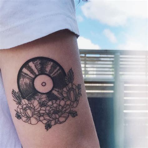 vinyl-record-with-florals-by-jessica-at-townhall-tattoo-auckland-in