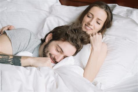 Couple Sleeping Hugging On Pillow Del Colaborador De Stocksy Studio