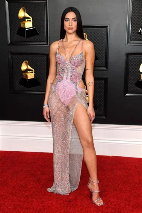 The star made several statements (style, safety) with her schiaparelli dress and matching mask. Take a glance at the glamorous looks of Grammy 2021 | IWMBuzz