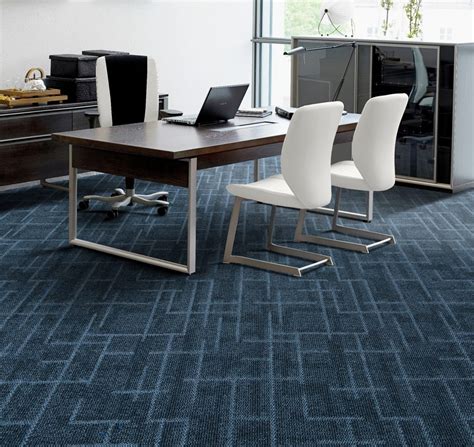 The adhesive can't be produced with a 'super glue' otherwise tile replacement will be too laborious. Office Carpets Tiles Installation in Dubai - Carpet supplier in Dubai