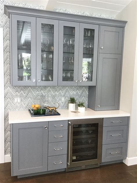 Custom Built In Bar With Grey Cabinetry And Wallpaper Backsplash Home