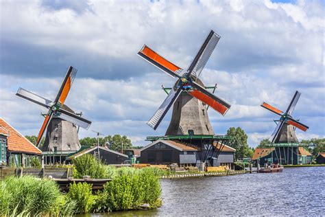 Traditional Dutch Old Wooden Windmill In Zaanse Schans The Netherlands