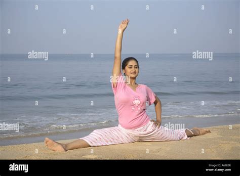 South Asian Indian Young Lady Doing Aerobics Performing Split With