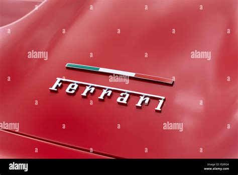 Ferrari Car Badge And Italian Flag Stock Photo Alamy