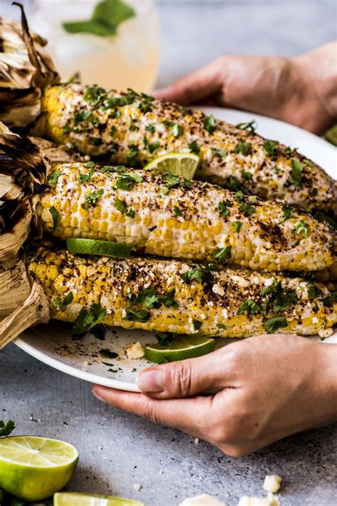 No mexican feast is complete without this juicy charred corn on the cob recipe. Easy Mexican Street Corn - Isabel Eats {Easy Mexican Recipes}