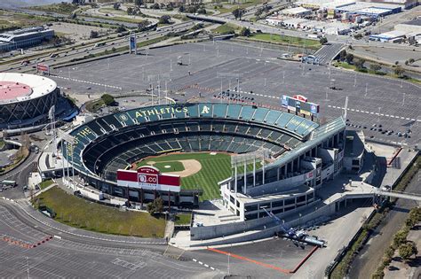 Sometimes, even for leisure, one must take care of. Oakland Raiders Stadium, Oakland Photograph by Dave Cleaveland