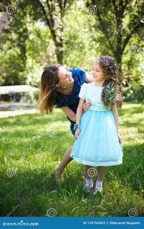 Happy Mother And Daughter Together Outdoors In A Park Stock Image Image Of Forties Camera