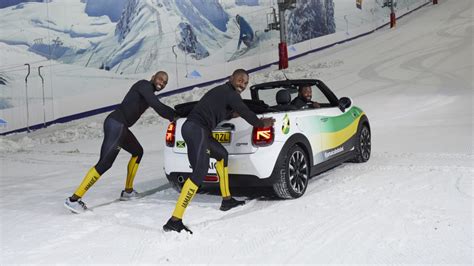 Jamaican bobsled team pushes a Mini Convertible up an ...