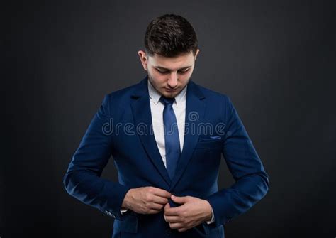 Handsome Businessman Buttoning His Suit Jacket Stock Image Image Of