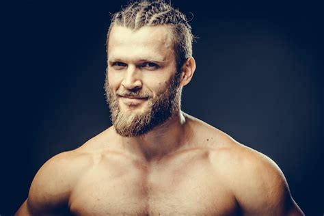 Premium Photo Portrait Of A Athleltic Muscular Bearded Man Posing