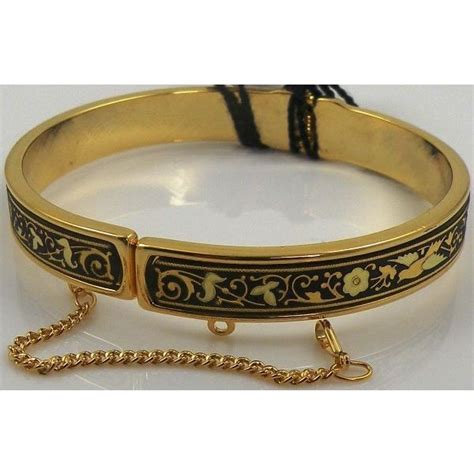 For damascened steel, see damascus steel. Damascene Gold Bird Bracelet by Midas of Toledo Spain ...