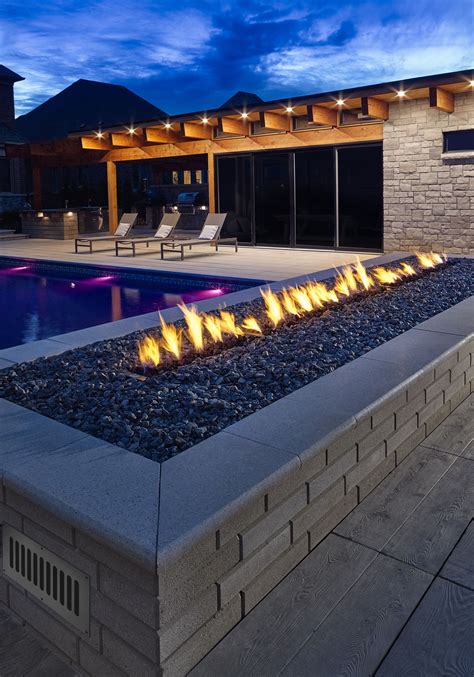 Firegear Outdoors Custom Fire Feature Next To Luxury Pool Fire