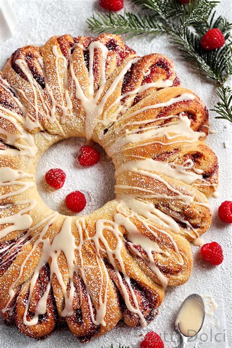 Almond flavoring milk (small amount) nut halves candied cherries (both red and green). raspberry vanilla wreath bread | Tutti Dolci