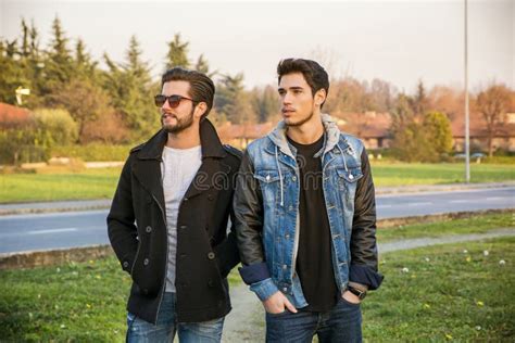 Two Handsome Young Men Friends In A Park Stock Photo Image Of