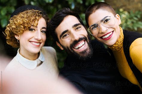 Laughing Friends Making Selfie By Stocksy Contributor Guille Faingold Stocksy
