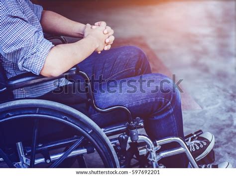 Paralyzed Man Praying On His Wheelchair Stock Photo Edit Now 597692201